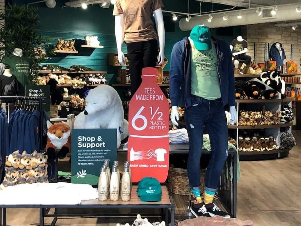 shop display of tshirts made from recycled plastic