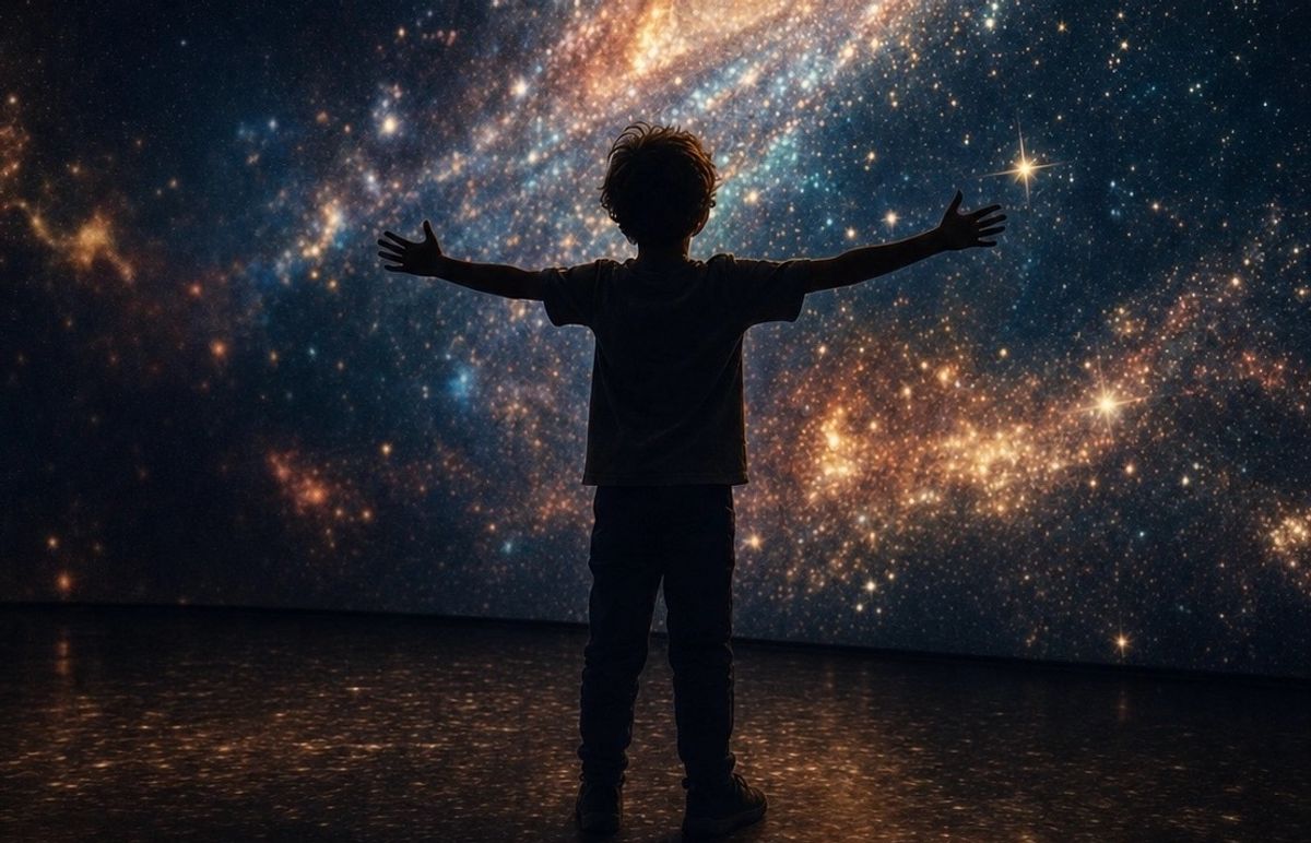 Silhouette of a child with arms outstretched, gazing at a star-filled galaxy display.