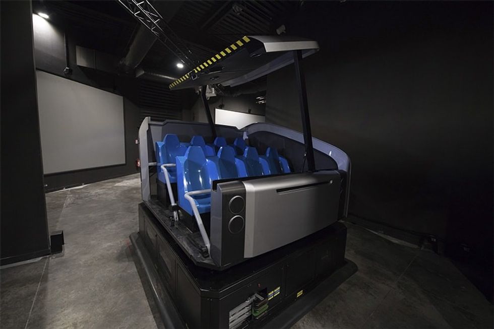 Simworx's AGV Dark Ride with door open and blue seats