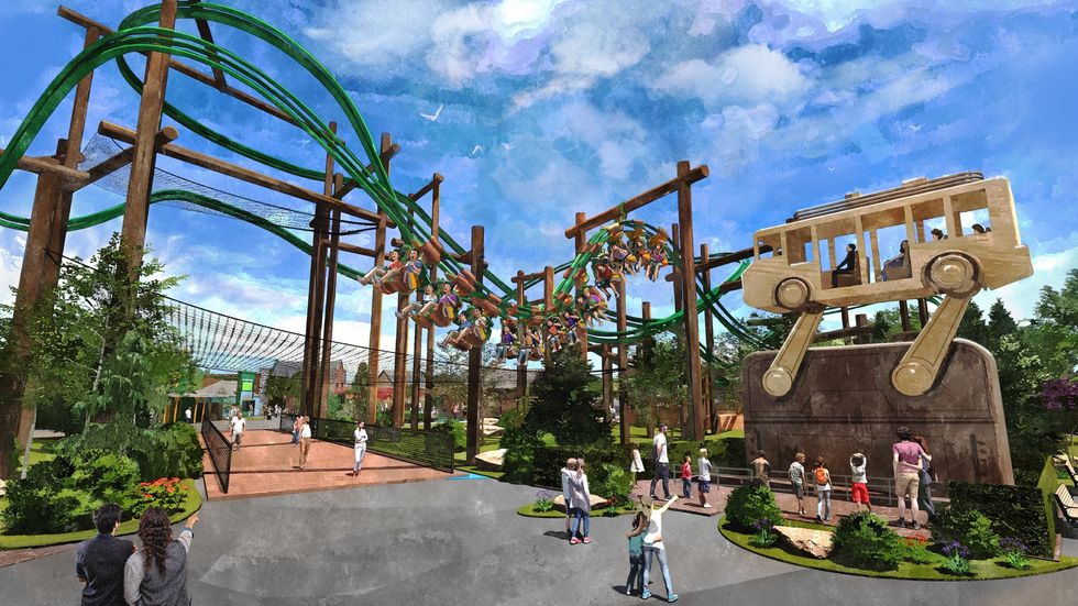 Six Flags Great America scene with a green roller coaster and a wooden bus sculpture