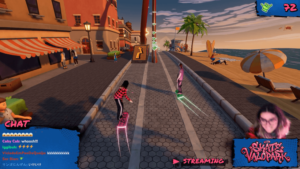 Skaters racing by the seaside in a vibrant video game with chat overlay.