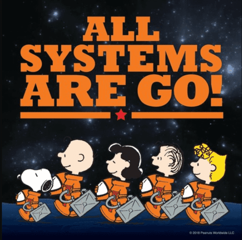 snoopy peanuts worldwide nasa space partnership