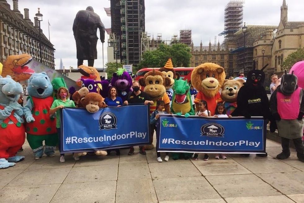 soft play mascots protesting outside Parliament