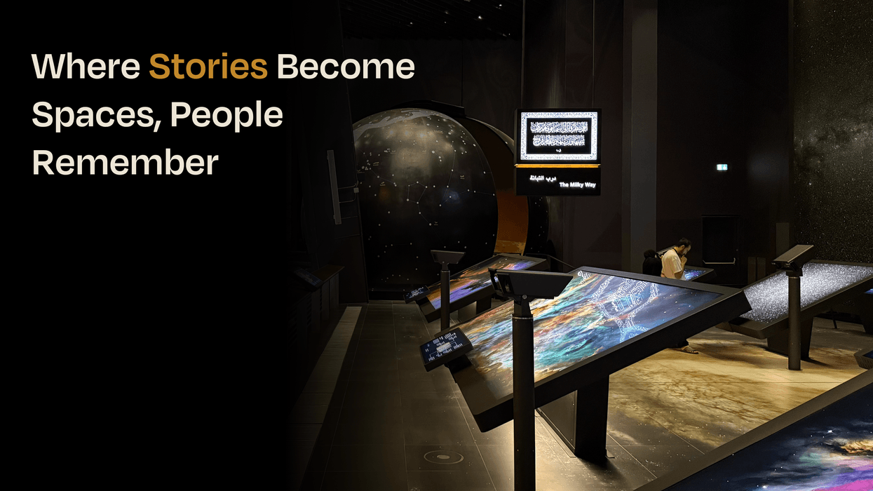 Space-themed exhibit with glowing screens and "Where Stories Become Spaces" text.
