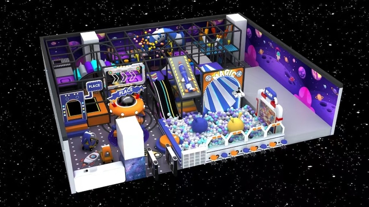Space-themed indoor playground with slides and ball pit in a colorful room.