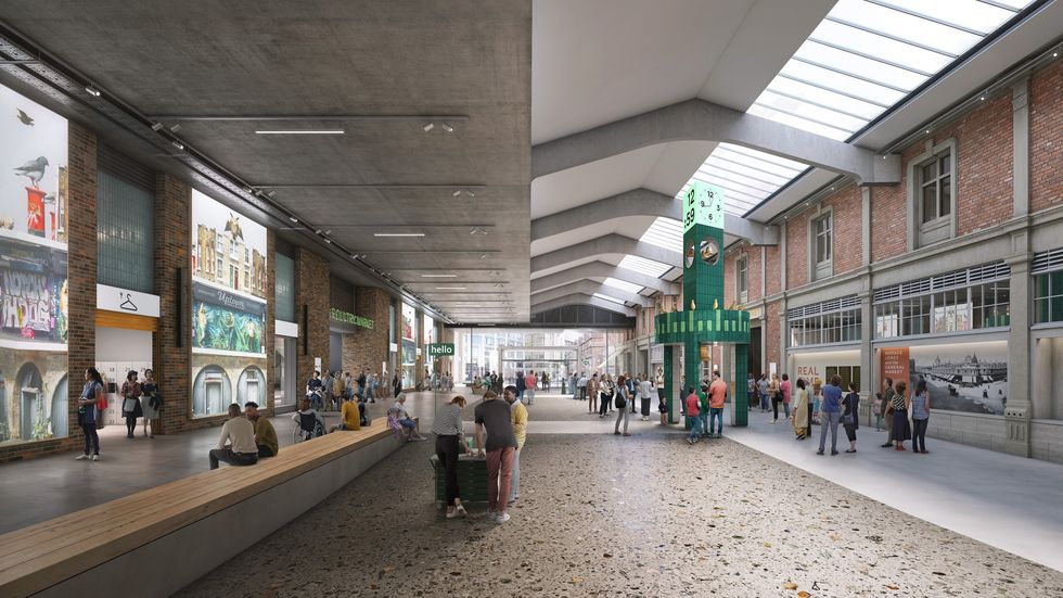 Spacious indoor market at the London Museum with people, skylights, and green clock tower.