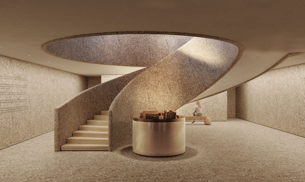 Spiral staircase with skylight and central display in a minimalist, stone-walled room. Centre for Contemporary Arts in Tashkent