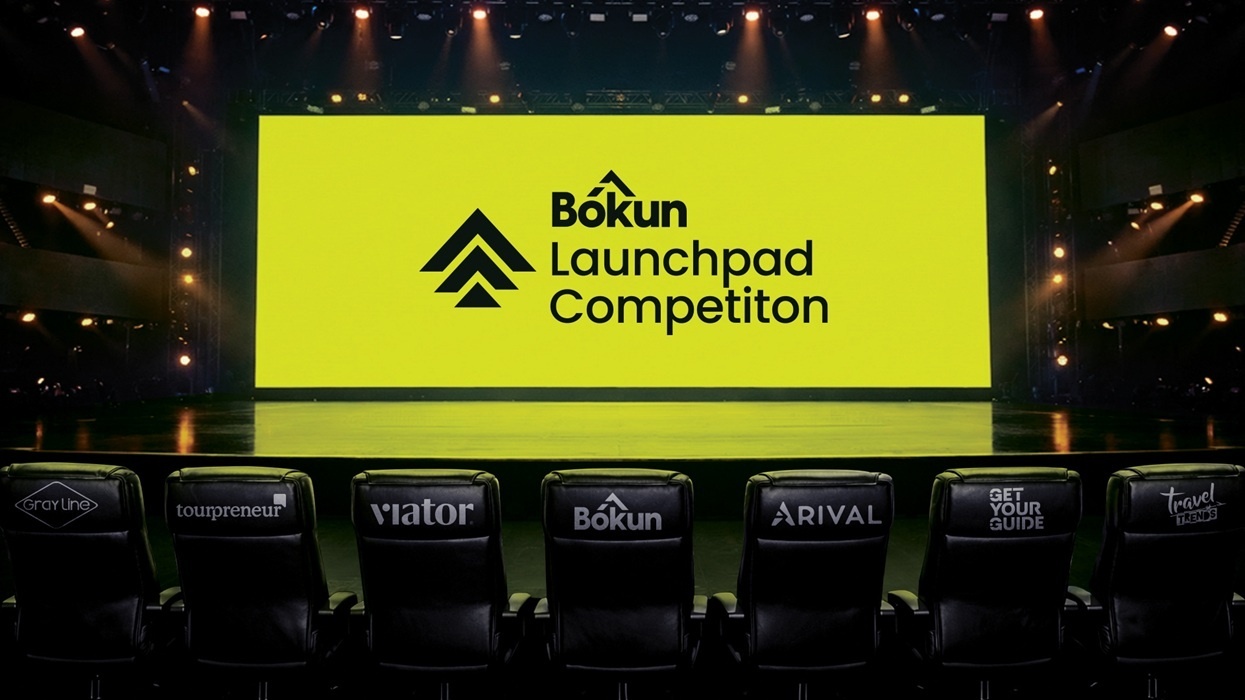 Stage with "Bókun Launchpad Competition" screen, branded chairs in the foreground.