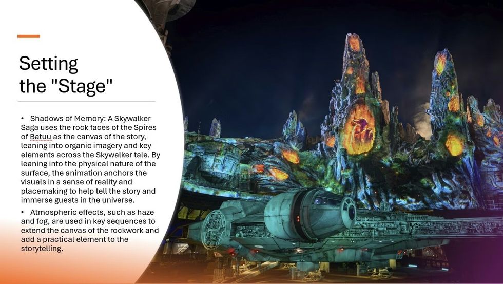 Starwars galaxy's edge with illuminated rocky formations at night.