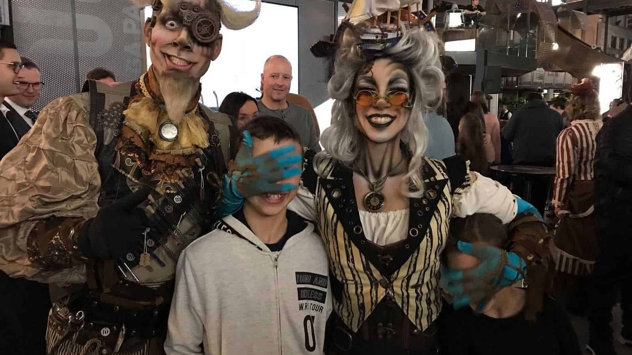 Steampunk Mega Parc characters taking photos with guests