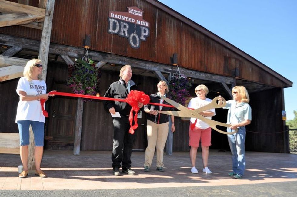 Steve and Jean Beckly cut the ribbon at the Haunted Mine Drop, Glenwood Caverns