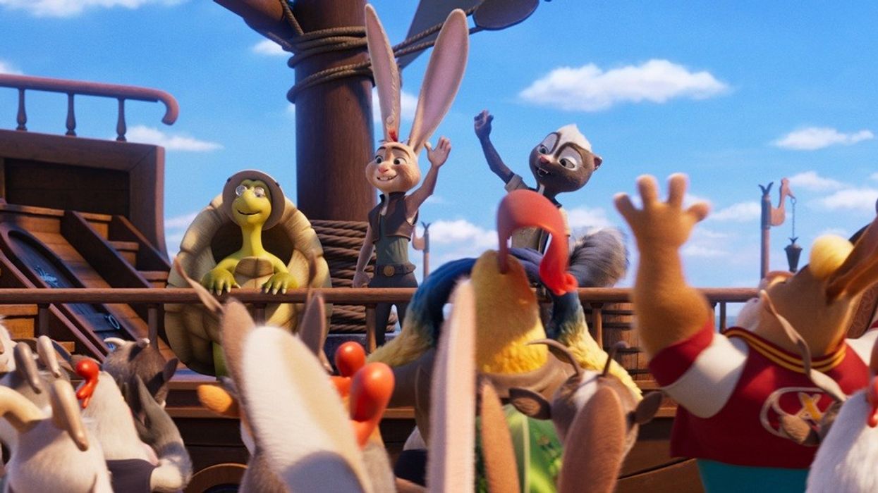 Still from Chickenhare and the Secret of the Groundhog with characters celebrating on a ship's deck under a sunny sky.