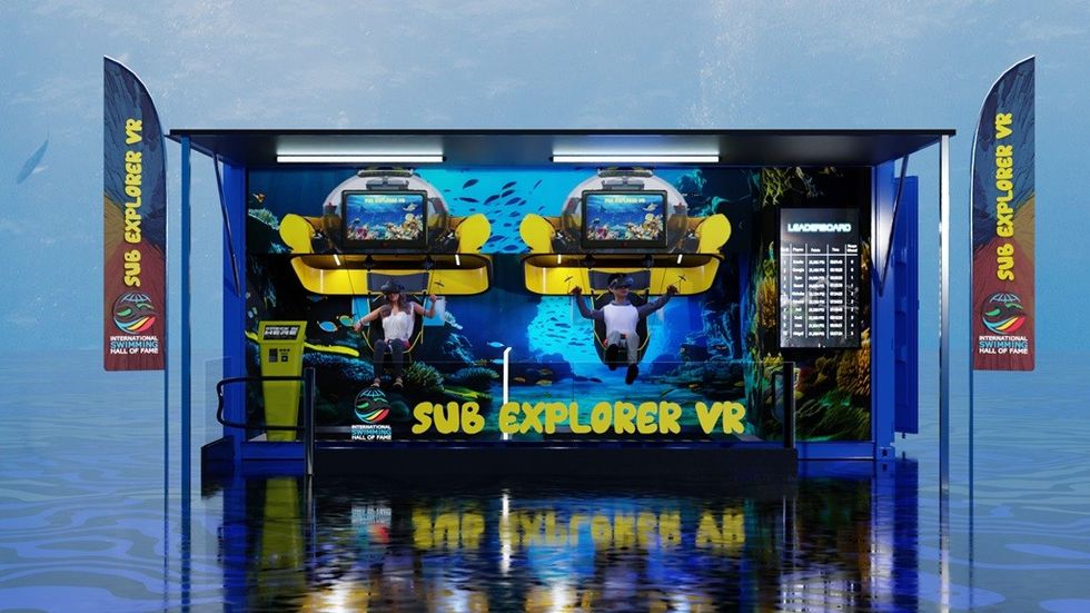 Sub Explorer VR booth with underwater theme and two VR stations on a reflective surface.