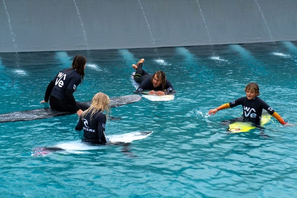 surfers in the water at The Wave Bristol