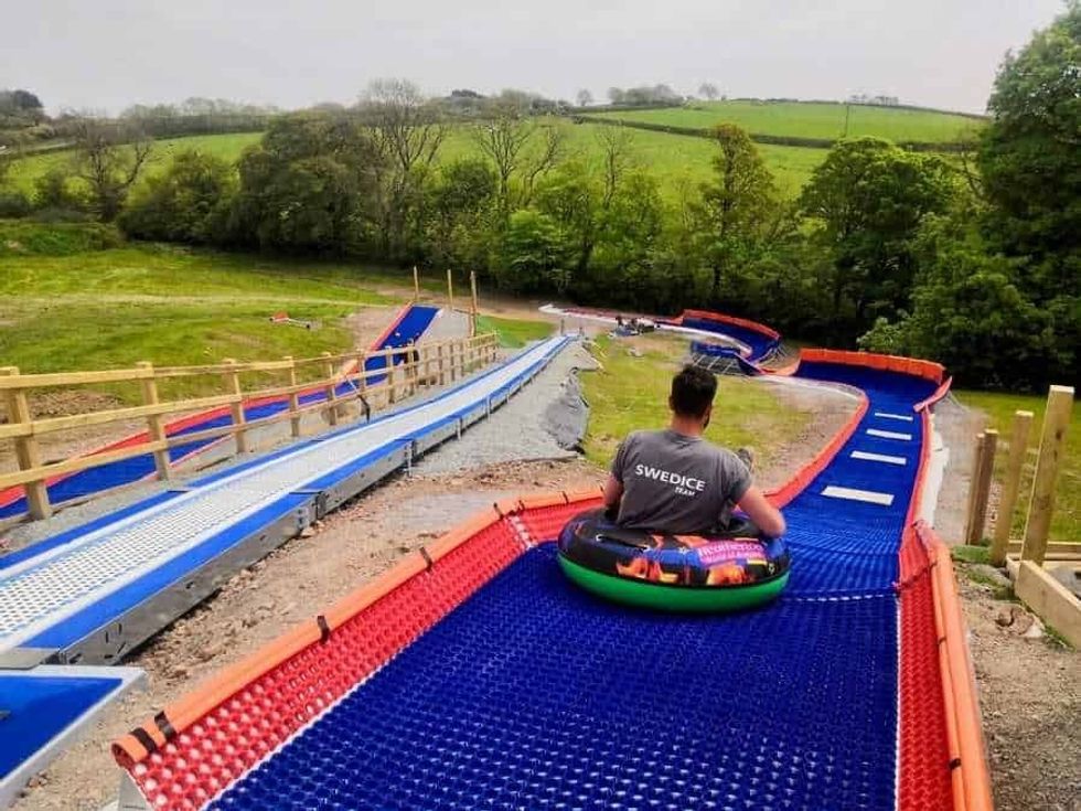 Swedice staff on tubby slide at Heatherton