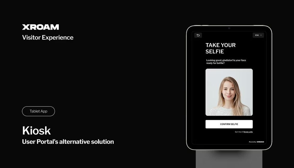 Tablet with selfie app interface, titled "TAKE YOUR SELFIE," on a black background.
