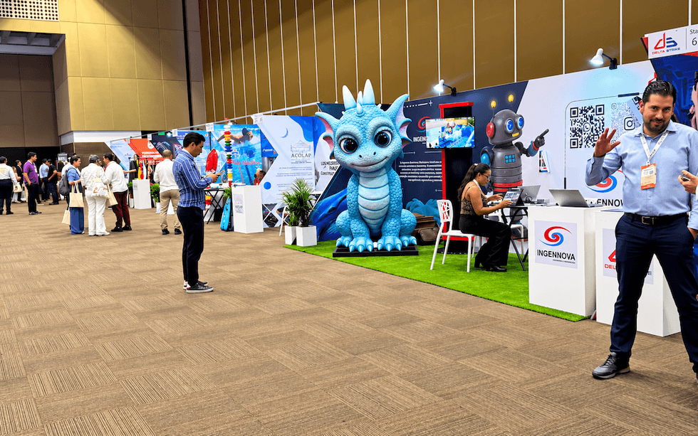 Tech expo with dragon model, people browsing booths, and tech displays.