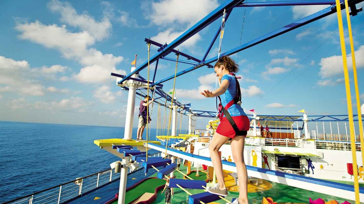 teenager on ropes courses inc. sky trail ropes course carnival cruise line