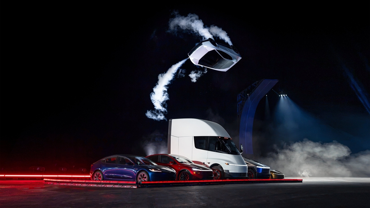 Tesla's flying car showcased with dramatic lighting and smoky effects