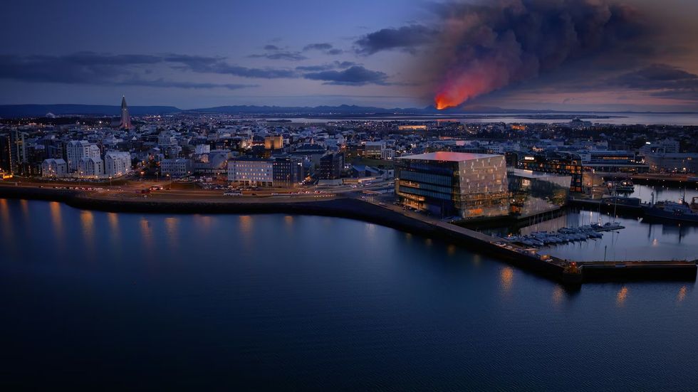 The Volcano Express Reykjavik skyline at dusk with distant volcanic eruption and ash plume.