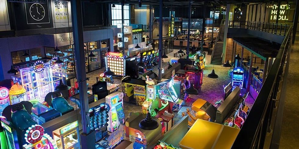 The Yard featuring amusement games at the Rec Room