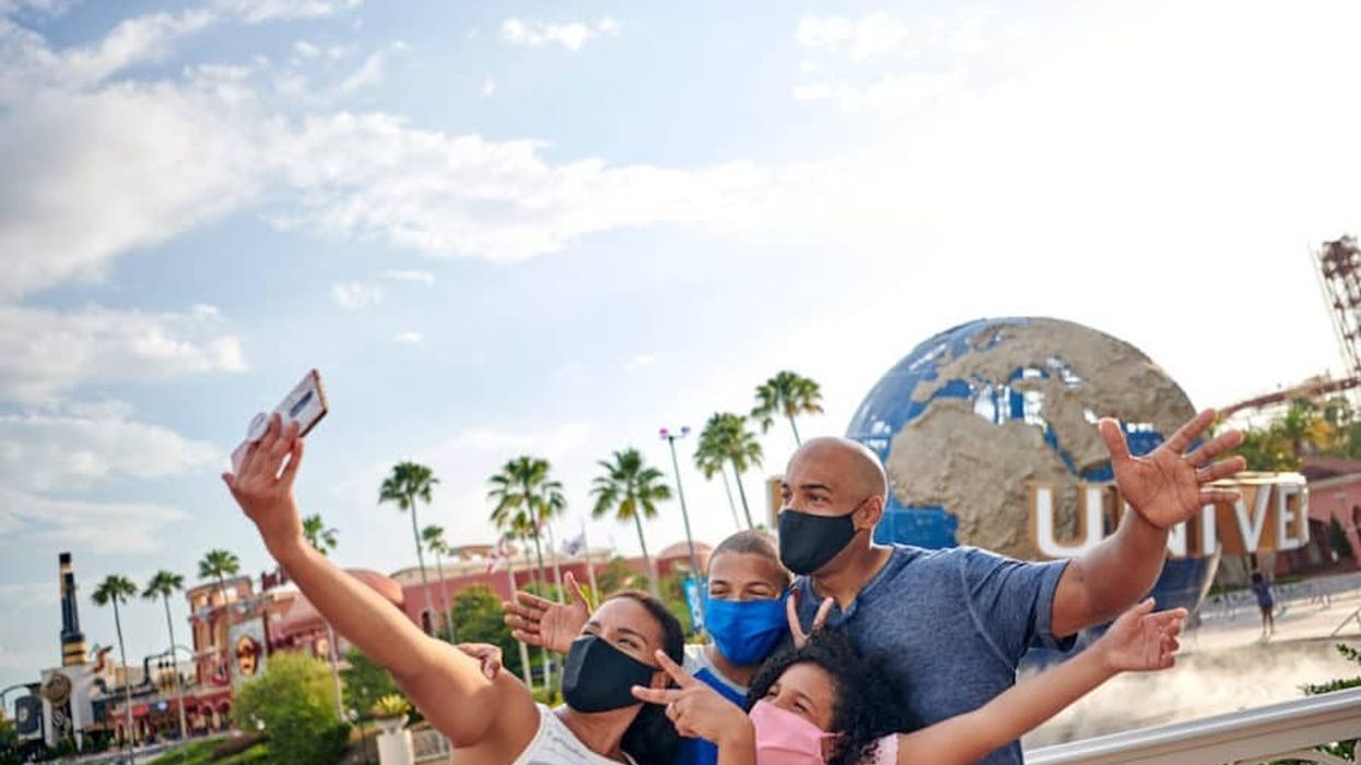 theme parks coronavirus family at Universal Orlando in masks