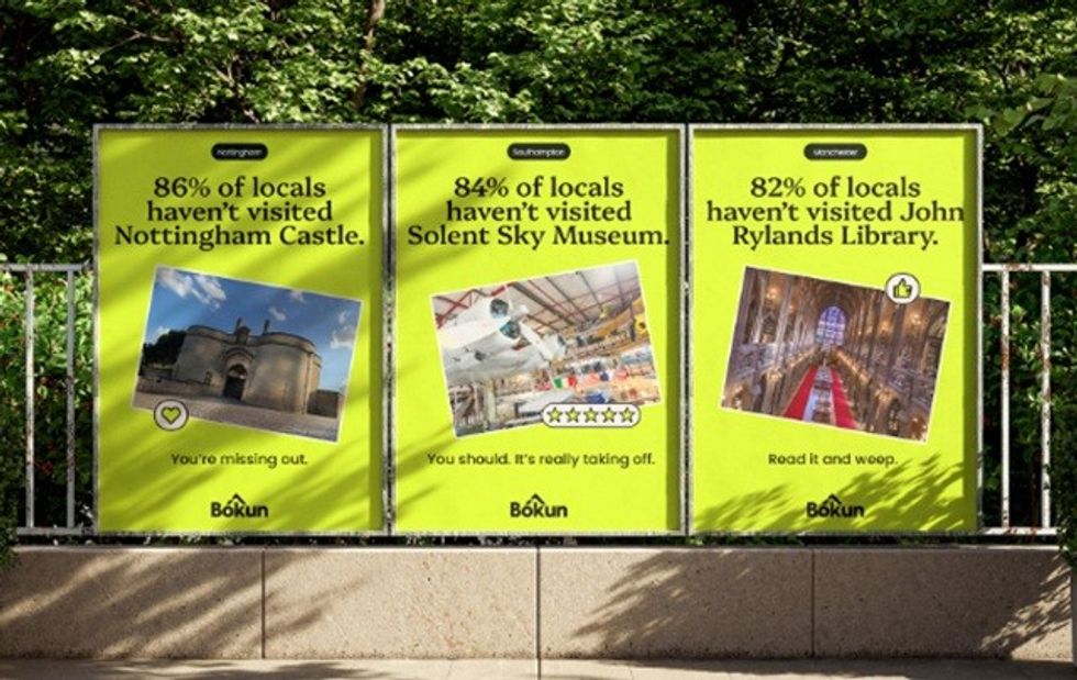 Three bright posters promote local attractions with visit statistics.