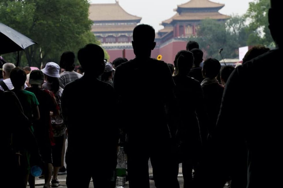 tourist at the forbidden city, china