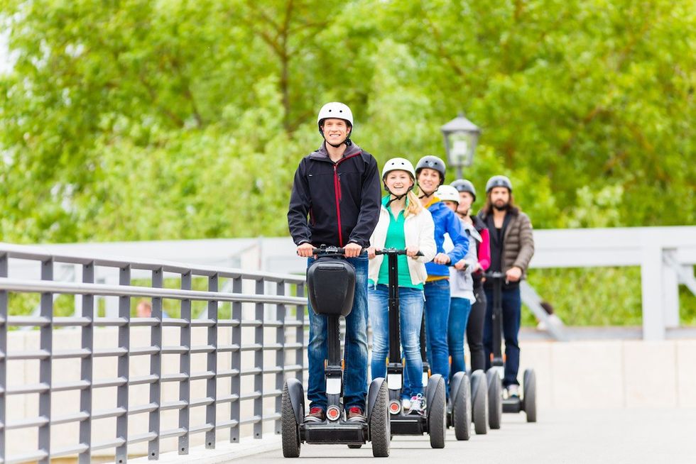 Tourist group having guided Segway city tour in Germany  google things to do