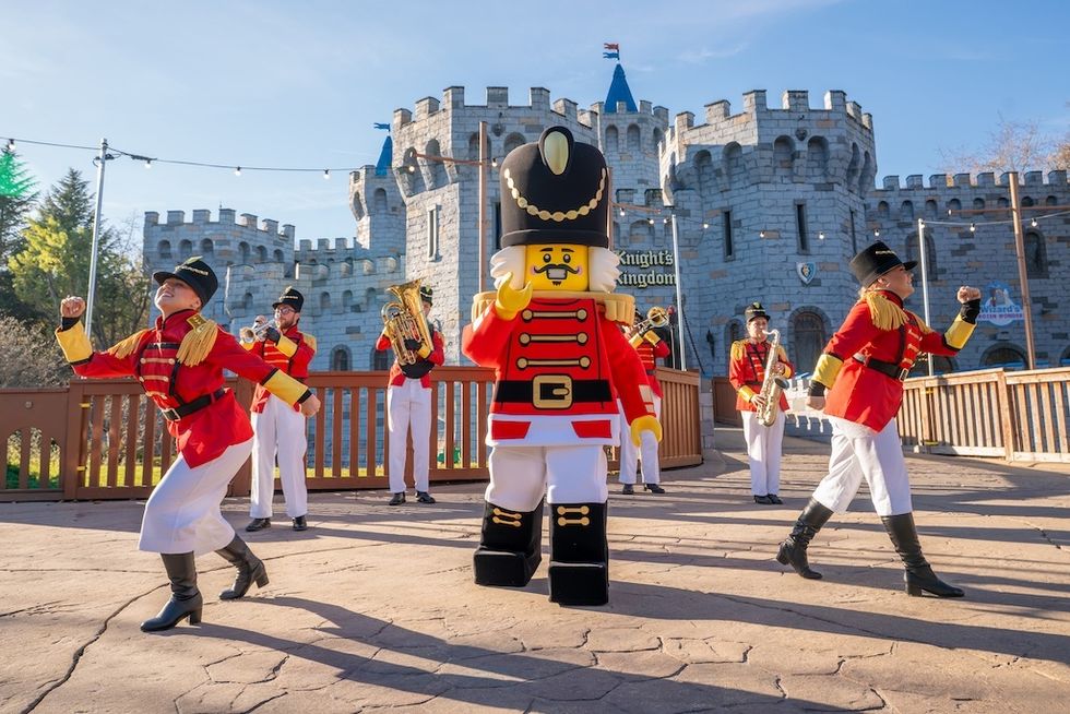 Toy soldiers and brass band performing at a Legoland theme park.