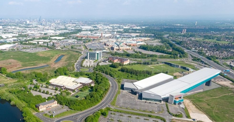 TraffordCity with ChillFactore in the foreground, the TraffordCentre in the middle and Manchester city centre on the horizon
