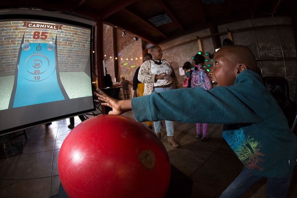 two bit circus boy with red ball