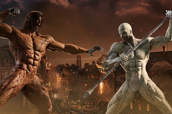 Two giant humanoid figures face off in a fiery, destroyed cityscape.