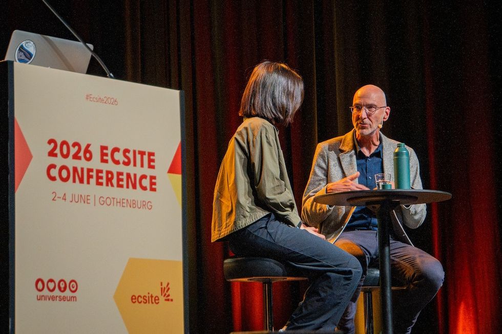 Two people conversing on stage at the 2026 ECSITE Conference in Gothenburg.