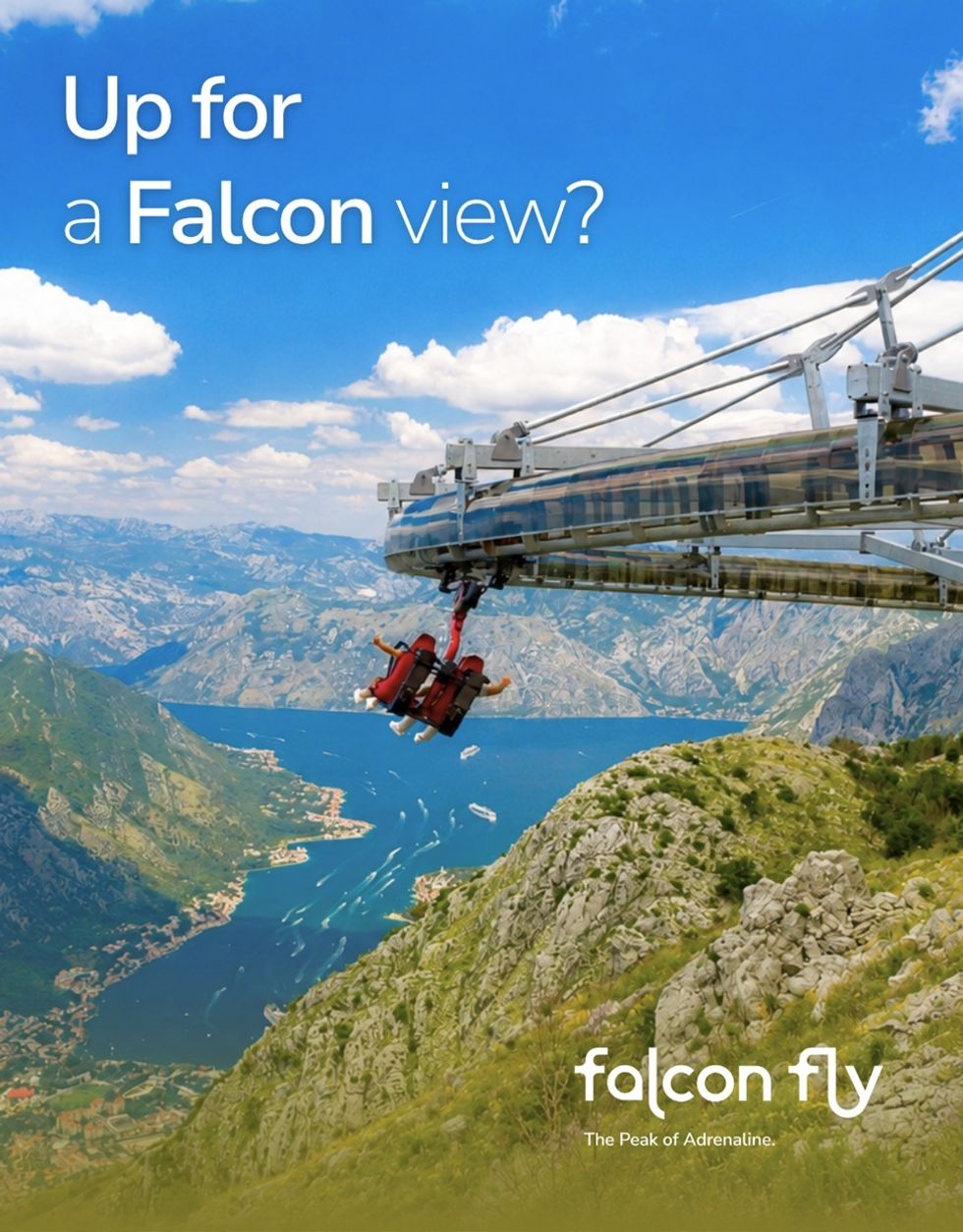 Two people on a Wie-Flyer named 'Falcon Fly' over mountains and a scenic bay view.
