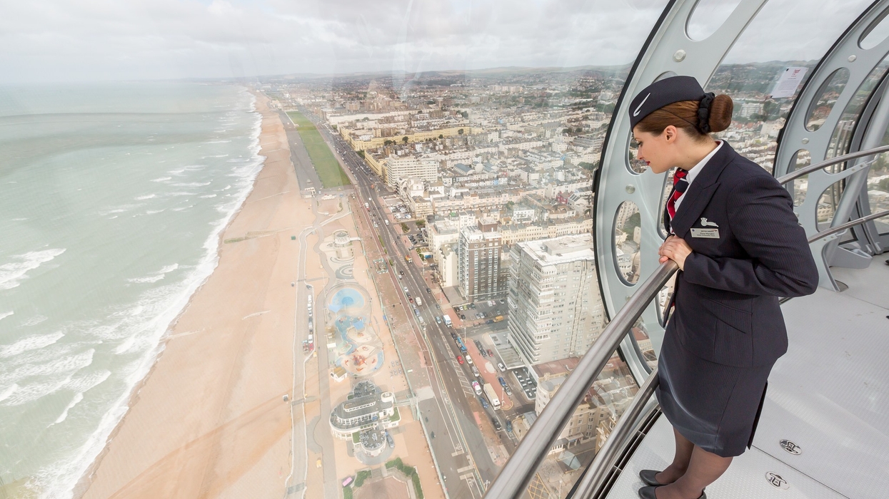 UK attractions air hostess looking at view British Airways i360