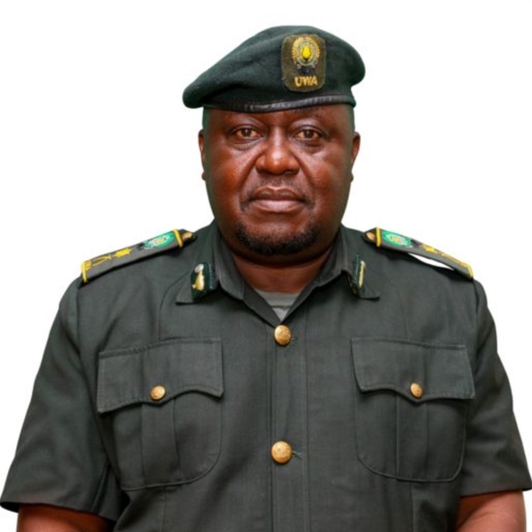 Uniformed man in UWA military attire with a beret, facing forward against a white background.