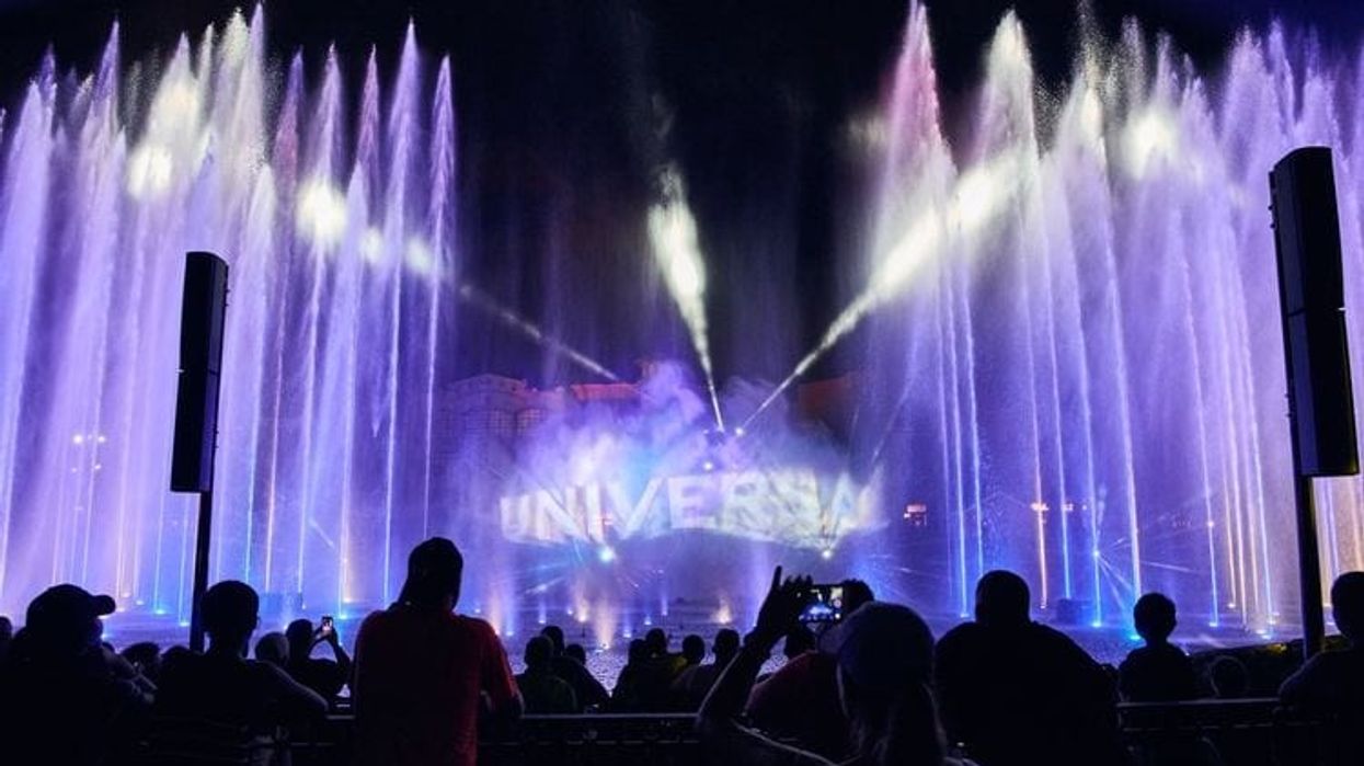 Universal Globe displayed on the water fountains at Universal Orlandos Cinematic Celebration