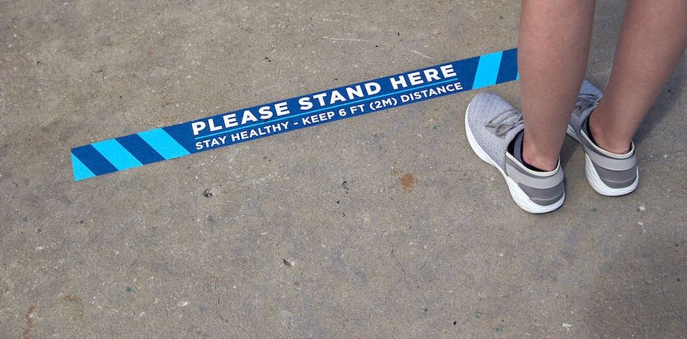 Universal Orlando floor marker COVID Restoring guest experiences