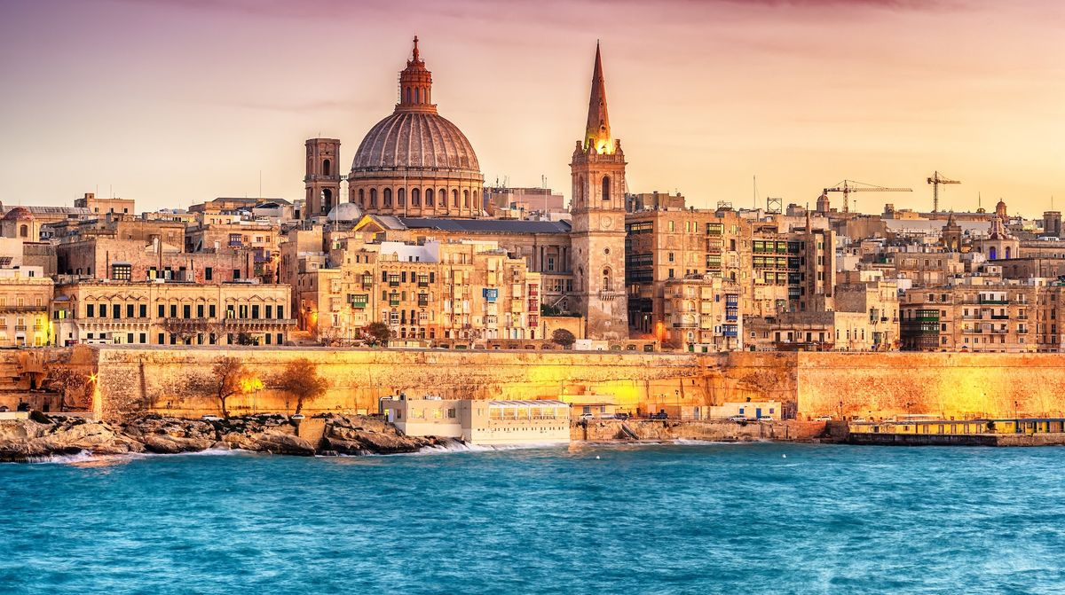 Valletta, Malta: skyline from Marsans Harbour at sunset