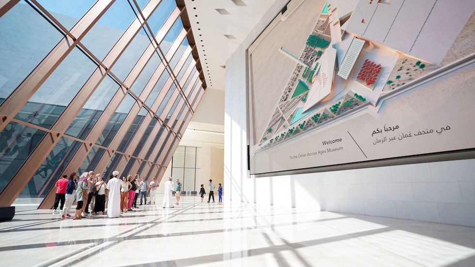 visitors arrive in the museum