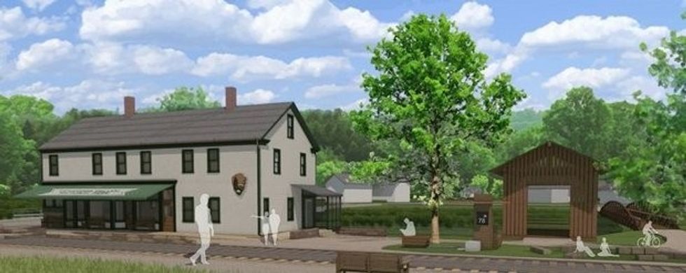 Visitors canhike or ride bikesalongthe park's many trails. Thesevisit numerous attractions, including the crushed limestone along sectionsof the 20 mile Towpath Trail.This trail follows a former stretch of the 308-mile Ohio and Erie Canal. Other attractions at the park include Waterfalls, caves and the lishscenery along the river. Steep narrow ravines and farmland form a contrast acrossthe park. The Ledges provide an ideal spot for visitorsto relax and take in thesunset over the forestbelow. In winter, Sled-riding is also popular at Kendall Hills. In addition, the park hasa variety of restored displays of 19th and early 20th century farming/pastoral equipment. There are alsoart exhibits, outdoor concerts and special event railroad tours on theCuyahoga Valley Scenic Railroad. visitor center