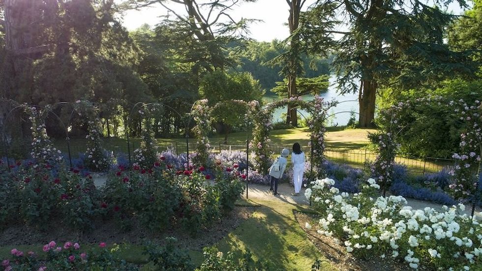Visitors enjoy the Rose Garden