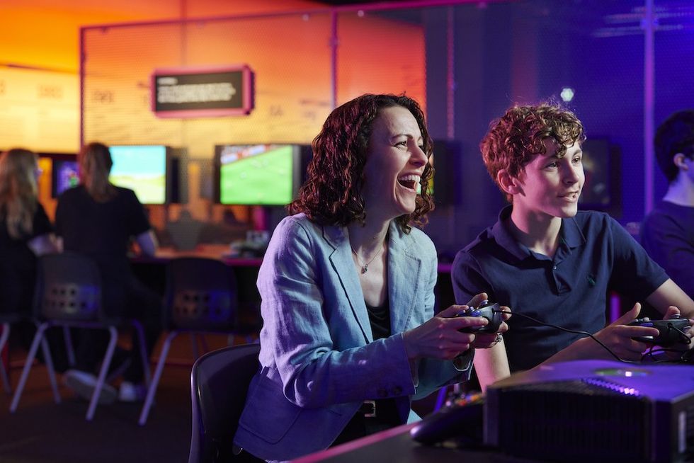 Visitors enjoying a game in Power Up, the Science Museum’s hands-on gaming experience.