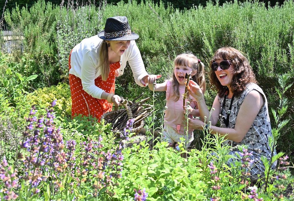 Visitors in garden at Shakespeare birthplace trust