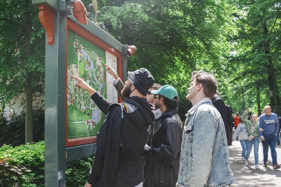 Visitors look at map Efteling