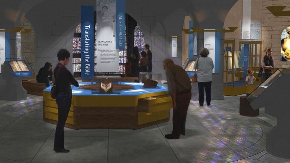 Visitors reading the information about the Translation exhibit at the Museum of the Bible