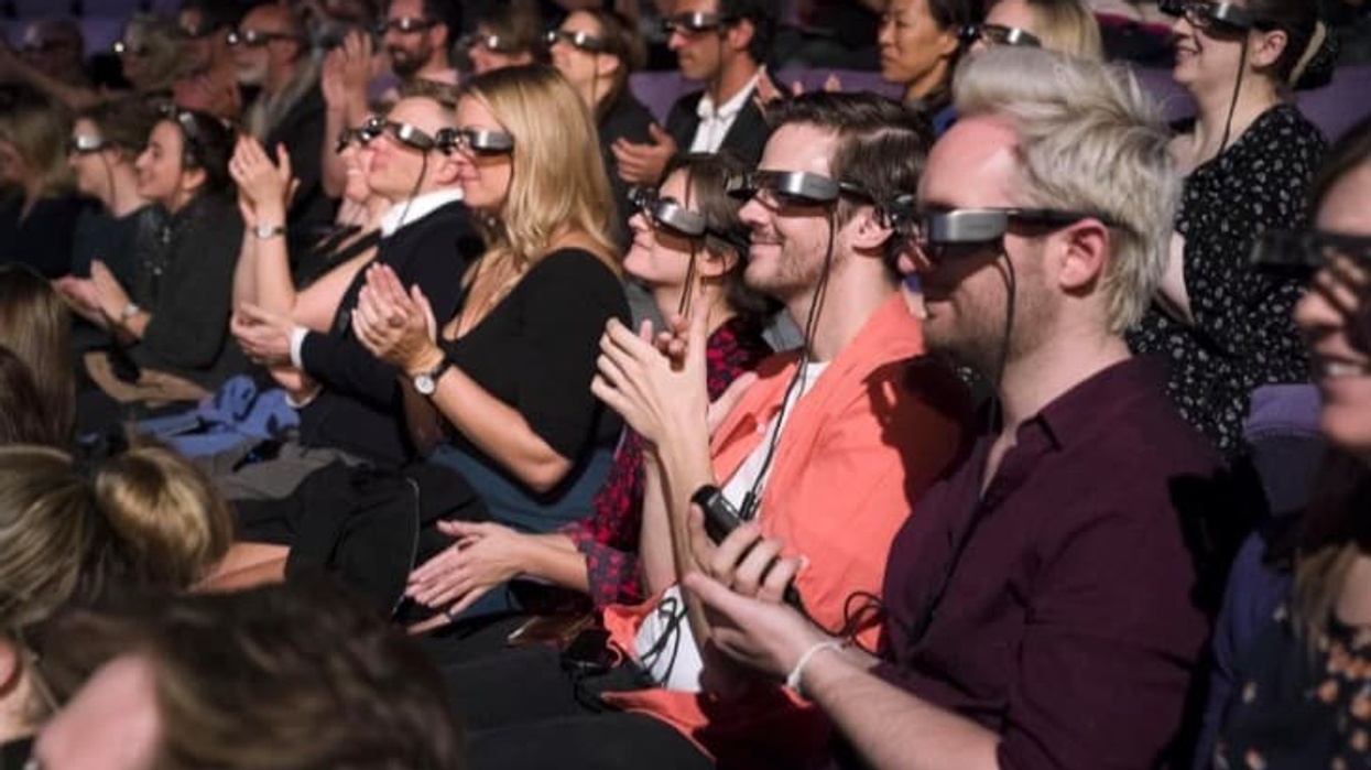 Visitors using Epson smart glasses at National Theatre