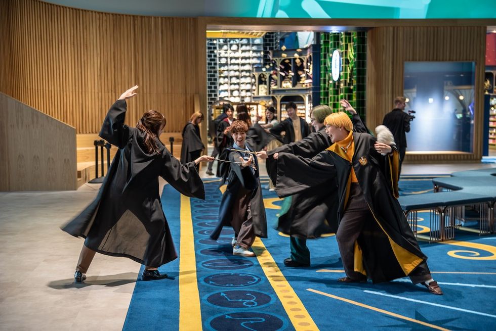visitors with wands harry potter studio tour tokyo