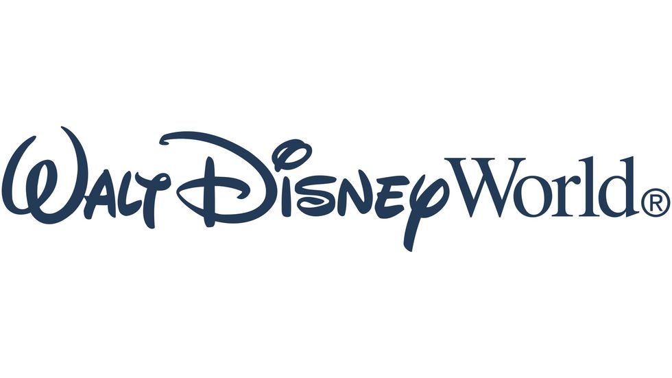 "Walt Disney World logo in blue, stylized font."